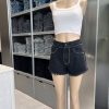 SHORT NEGRO TACHAS - TW7